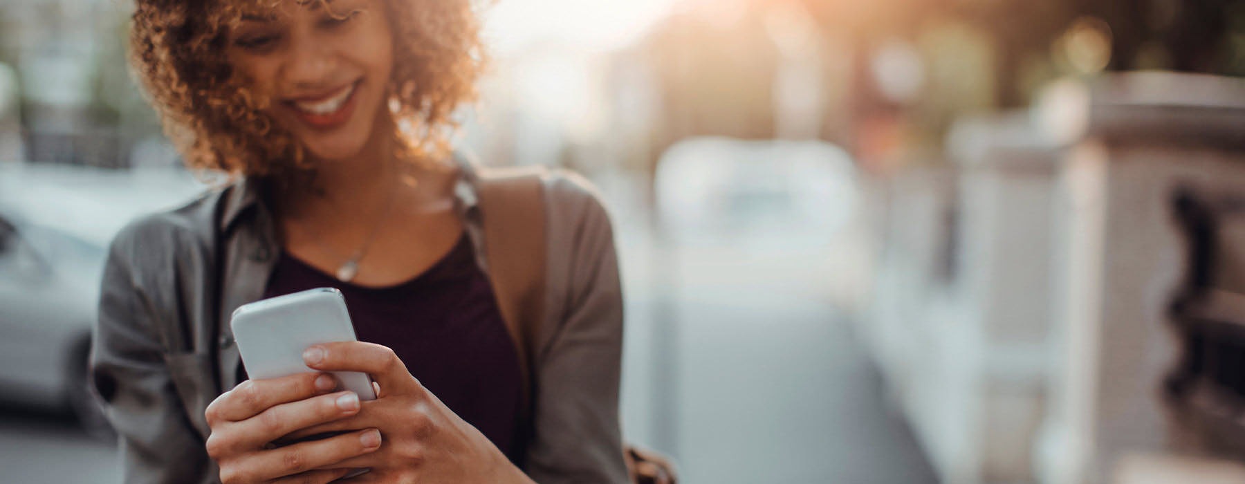 a woman holding a phone